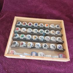 Handmade display of vintage NFL mini mugs