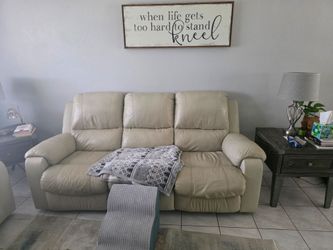 Leather couches in two and tables