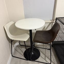 Small round café table with 2 chairs