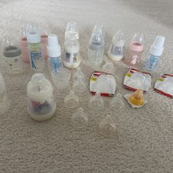 Assortment Of Baby Bottles And Nipples