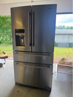 Maytag Four Door French Refrigerator/Freezer with Ice Maker Dispenser