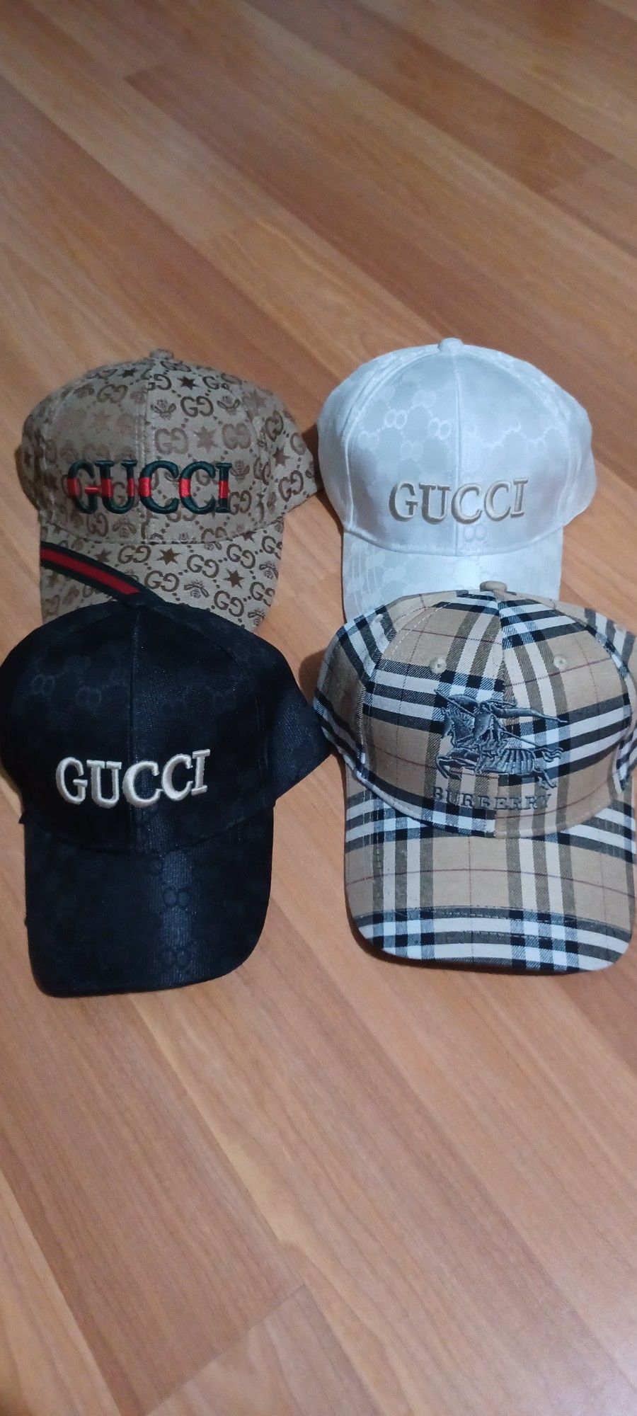 Gucci Hat $35 Each and Burberry $35