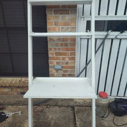 Tall white wooden ladder shelf storage unit