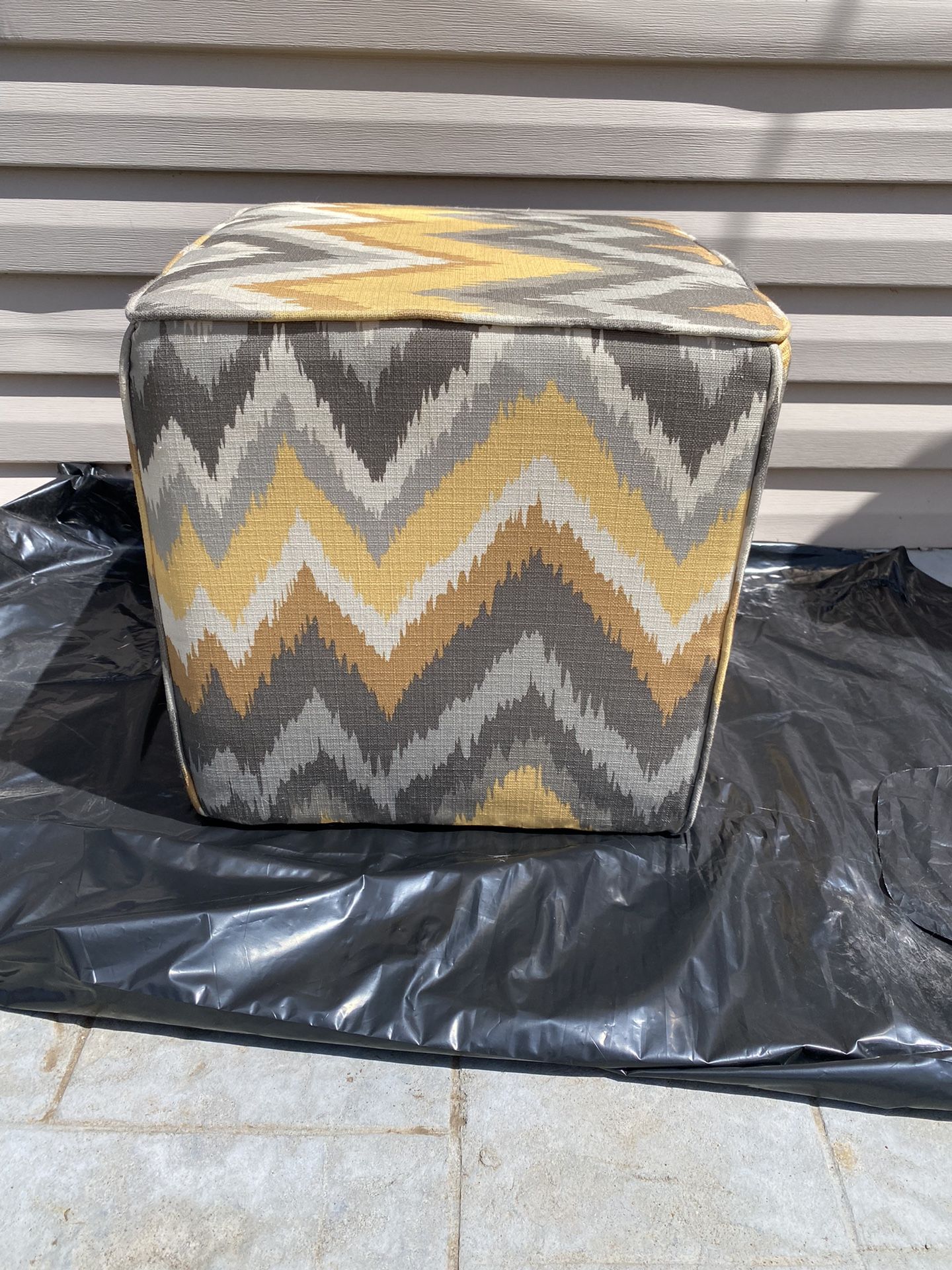 Two Yellow Pattern Ottomans 