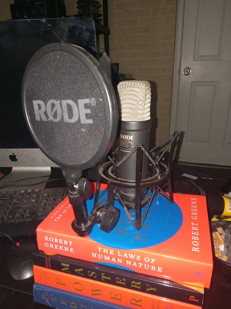 Rode Nt1 Studio Quality Condenser microphone. Includes mount and pot filter.