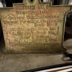 1911 cast-iron sign