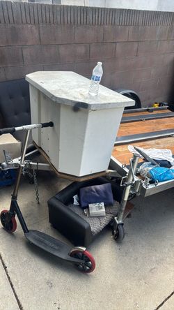 Motorcycle trailer with storage box