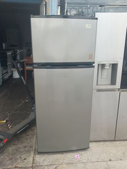 Whirlpool Apt size stainless steel refrigerator delivered & installed with a 30 day warranty