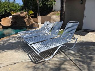 4 heavy duty steel and vinyl chaise lounge chairs