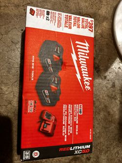 Milwaukee 5.0 Batteries And Charger.