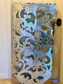 Pier 1 Imports mosaic mirrored wall panel features intricate cutwork overlaid w decorative mirrored tiles