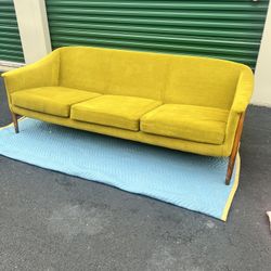 mid-century modern style yellow fabric sofa with natural rubber wood legs