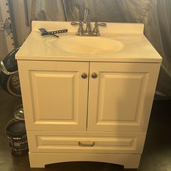 Bathroom vanity with faucet