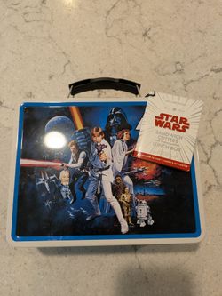 New with tags tin star wars lunch box with sandwich cutters.