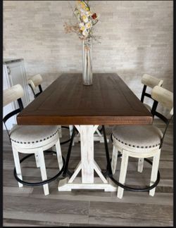 Real solid wood table with swivel chairs