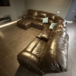 Brown power reclining leather furniture set