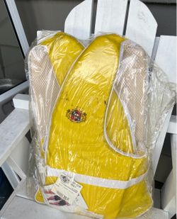 Two vintage coast guard rated life vests
