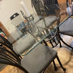 Glass table with 6 chairs 