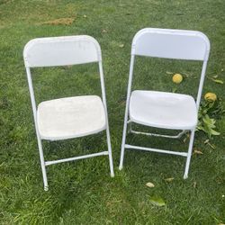 2 White foldable chairs—L@@k 