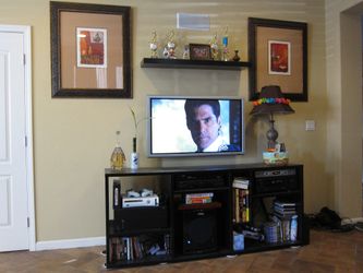 Crate and Barrel black wood shelf entertainment stand