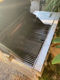 Propane grill will rotisserie