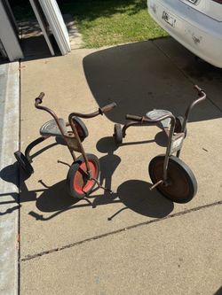Two vintage tricycle