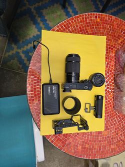 Sony A6000 bundle with a small rig cage and 2 lenses.
