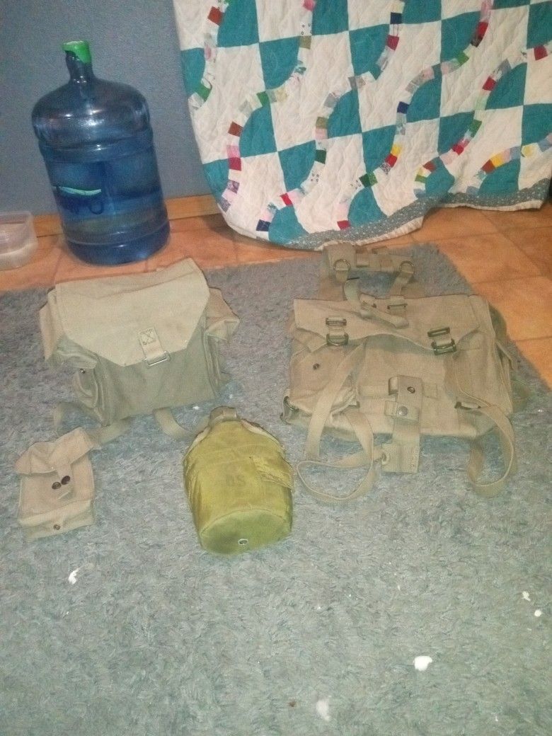 Military Backpack With Stuff That Goes With It