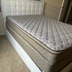 Queen size bed with mattress and box springs