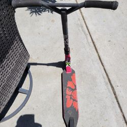 Red and Black Scooterfarm Scooter