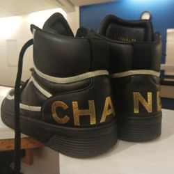 CHANEL Leather high top sneakers Size 39