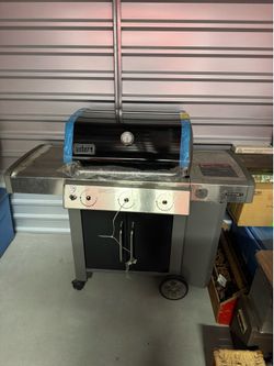 Brand New Weber Grill.