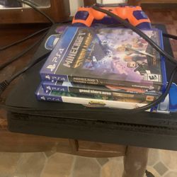 PS4 Game System and 4 Games