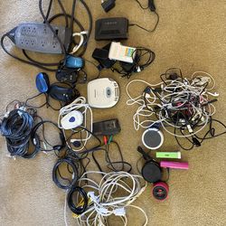 Big bundle of electronic cables, mics, speakers, power, banks, cables, power, outlet, etc.