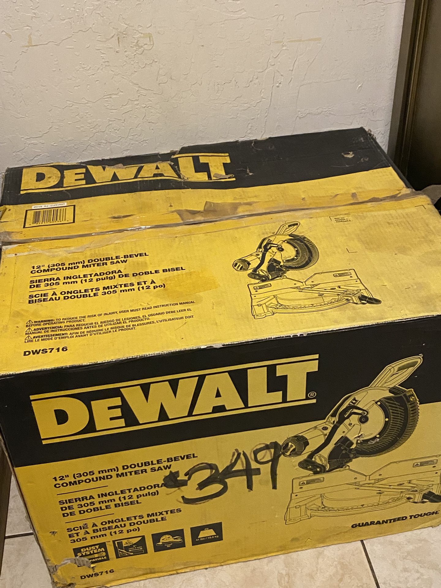 DEWALT 12-inch Double-Bevel Compound Miter Saw, model DWS716.
