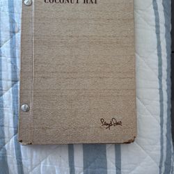 Laughter wears a Coconut Hat