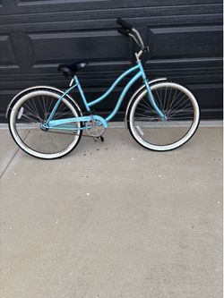 Two beach cruiser bikes