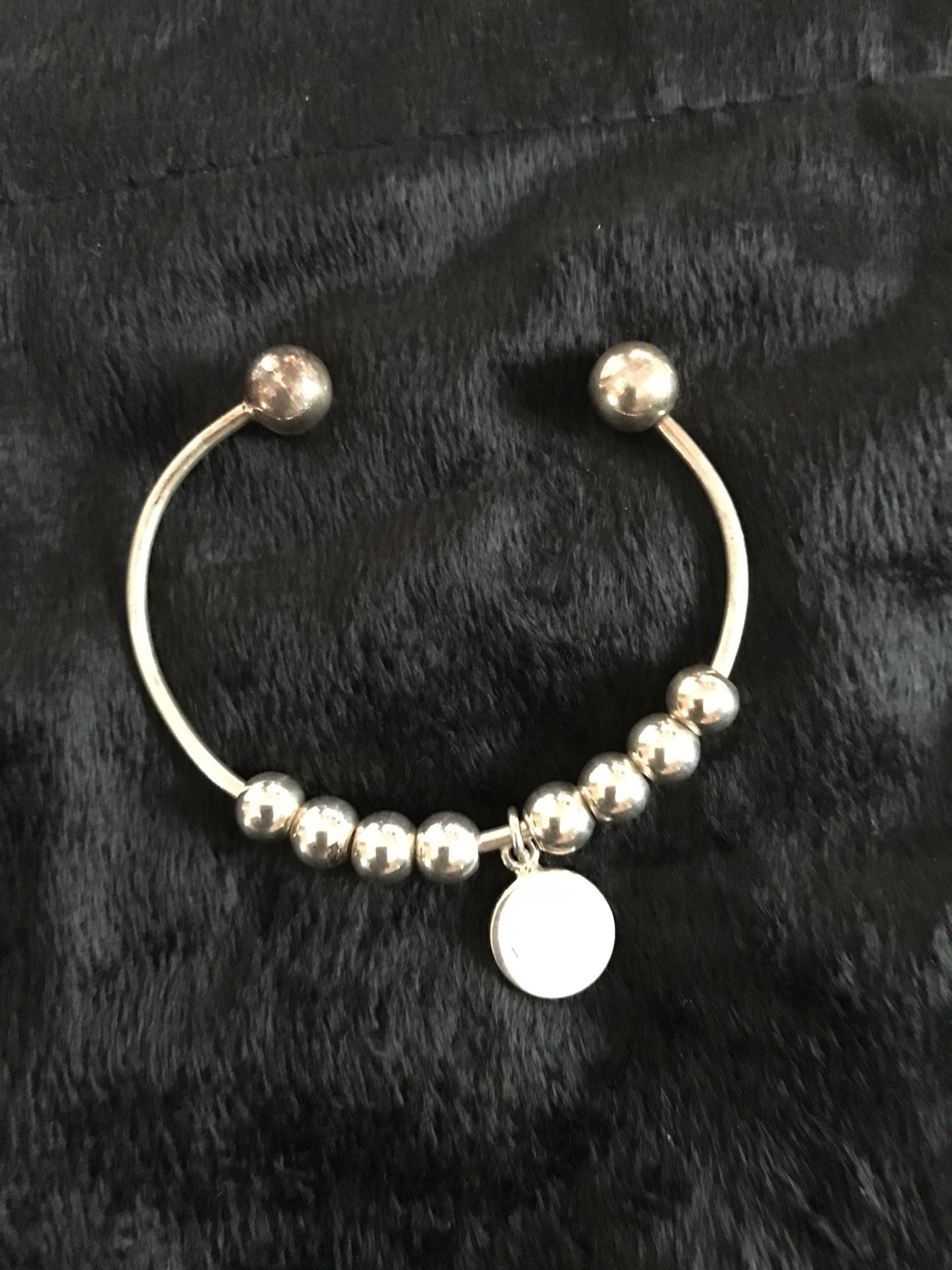 Monogram style sterling silver bracelet.