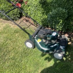 mower, sharp blade, self propelled, runs good, no bag.