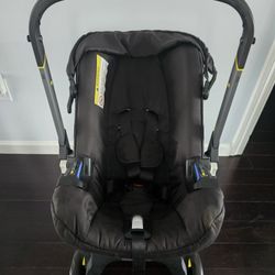 Black, Doona-like Stroller Transforms To Car Seat