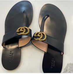Black Gucci sandals