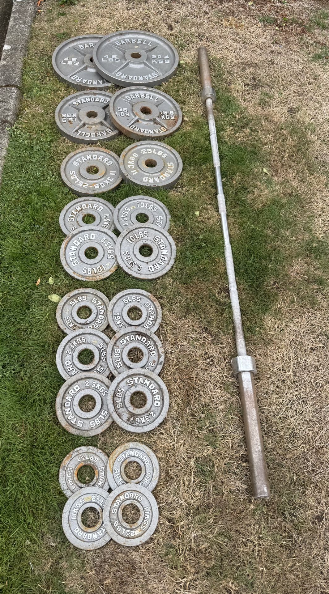 Steel Weight Plates And Barbell 