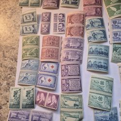 This is a collection of fifty two pairs of mint condition u s postage stamps