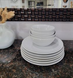 10 piece dinnerware set. Design and Quality IKEA of Sweden. Made in China. Gently used. No breakages.