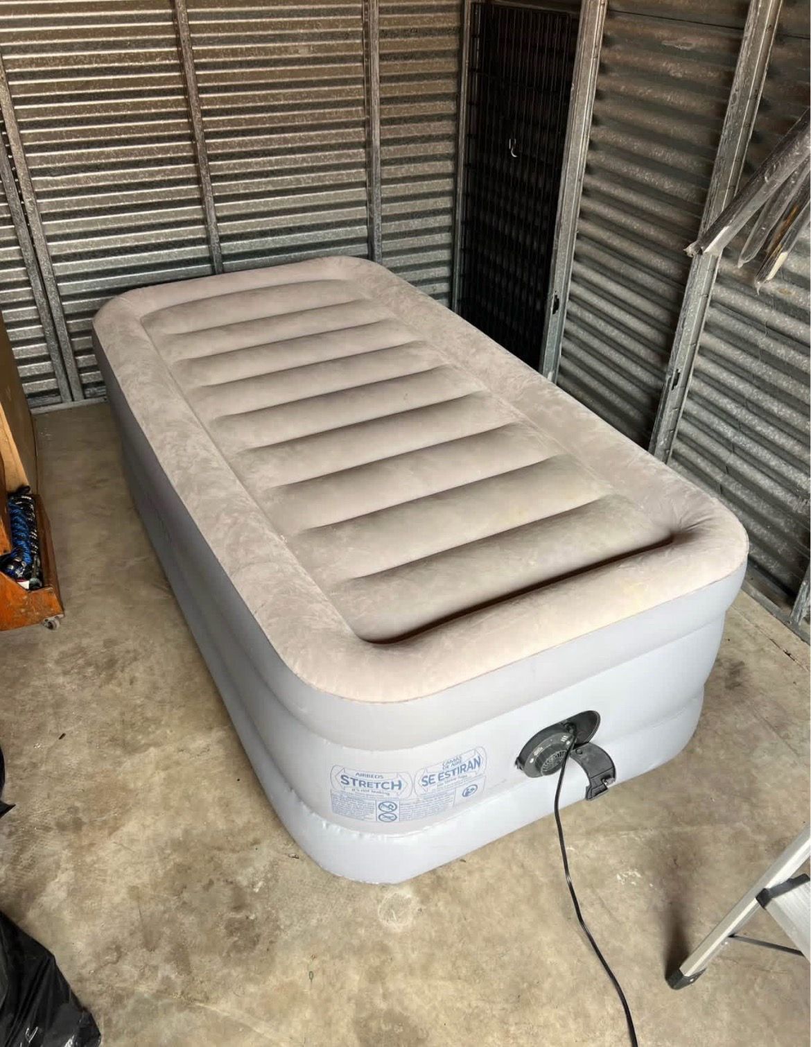 Intex Twin air mattress with built-in electric pump.