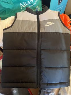 Size 5 Nike vest