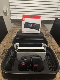 NINTENDO OLED SUPER BUNDLE