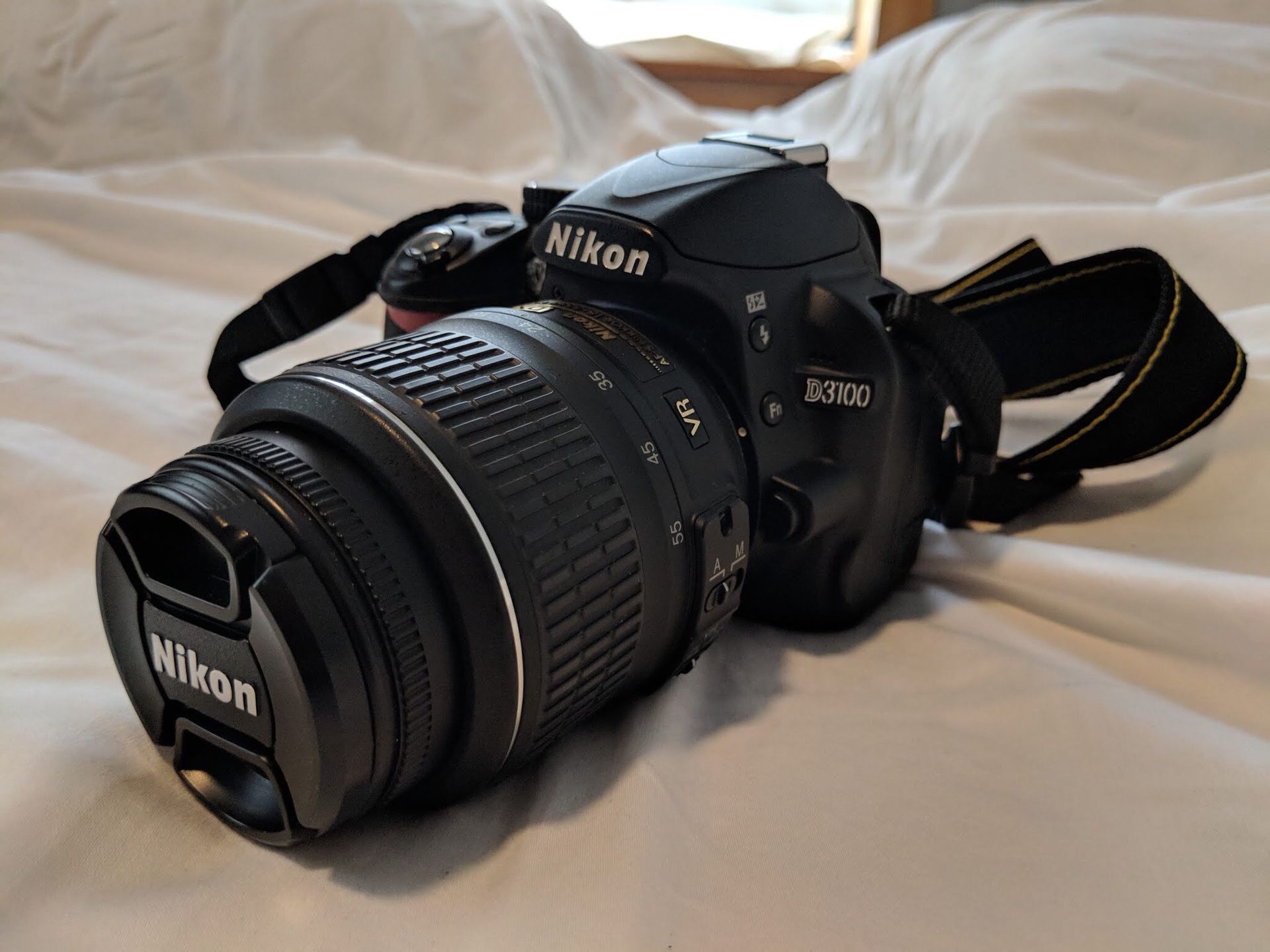 Nikon DSLR D3100 Camera with 55-200mm Lenses and Carrying Bag