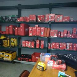 Milwaukee Tool Room Full Of Assorted Hand Tools Accessories Chargers And Packout Kits Prices And Type Of Tools May Vary 