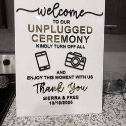 white acrylic unplugged sign